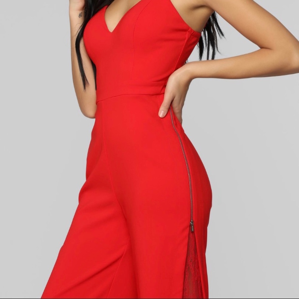 Red jumpsuit with lace inserts size L